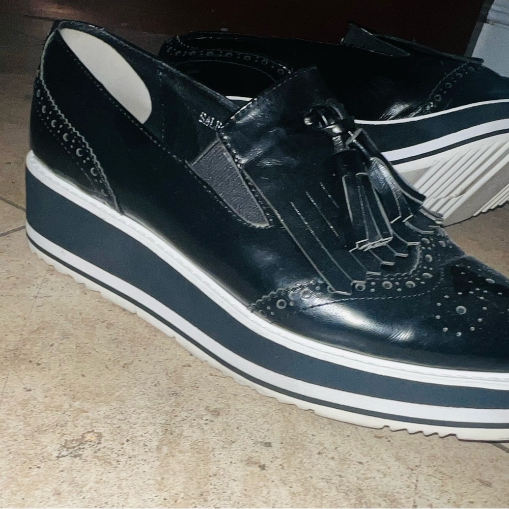 Black Platform Loafers with Tassel Detail